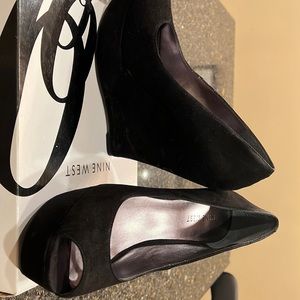 Black Nine West wedge peep toe heels. Size 8.5.